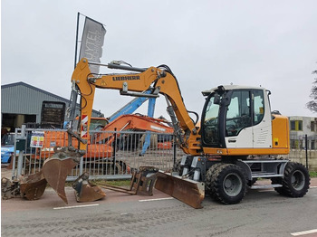 Колёсный экскаватор LIEBHERR A 910