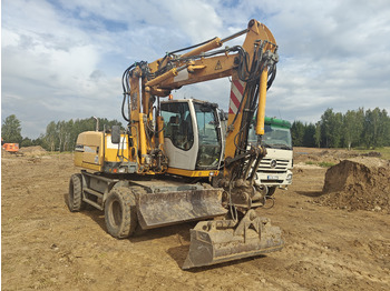 Колёсный экскаватор LIEBHERR