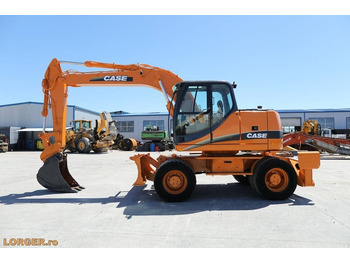 Колёсный экскаватор CASE