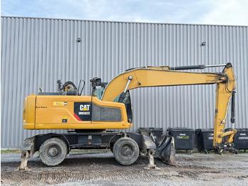 Колёсный экскаватор CATERPILLAR MH3022