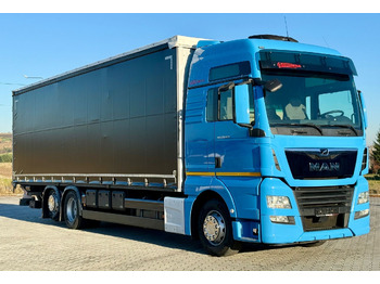 Тентованный грузовик MAN TGX