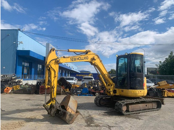 Мини-экскаватор NEW HOLLAND