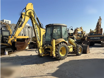 Экскаватор-погрузчик NEW HOLLAND
