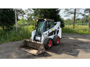 Мини-погрузчик с бортовым поворотом BOBCAT