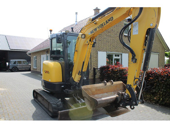 Мини-экскаватор NEW HOLLAND