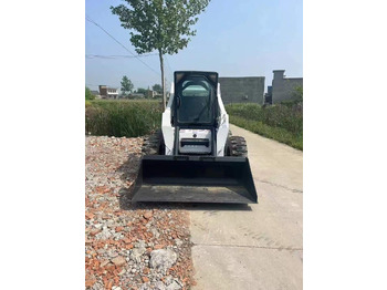 Мини-погрузчик с бортовым поворотом BOBCAT