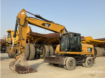 Колёсный экскаватор CATERPILLAR M318D