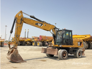 Колёсный экскаватор CATERPILLAR M318D