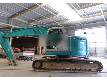 Гусеничный экскаватор NEW HOLLAND