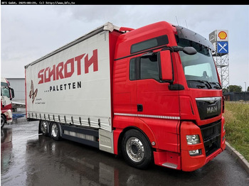 Тентованный грузовик MAN TGX 26.440