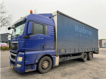 Тентованный грузовик MAN TGX 26.400