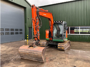 Экскаватор NEW HOLLAND