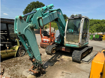 Гусеничный экскаватор KOBELCO