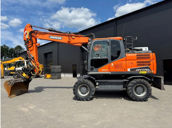 Колёсный экскаватор DOOSAN