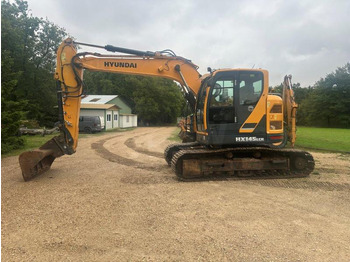 Гусеничный экскаватор HYUNDAI