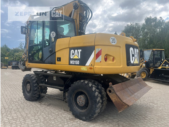 Колёсный экскаватор CATERPILLAR M315D