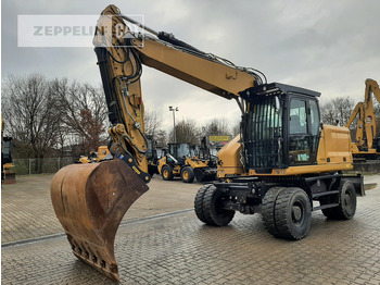 Колёсный экскаватор CATERPILLAR M318