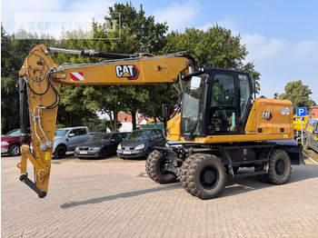 Колёсный экскаватор CATERPILLAR M318