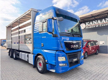 Тентованный грузовик MAN TGX 26.500