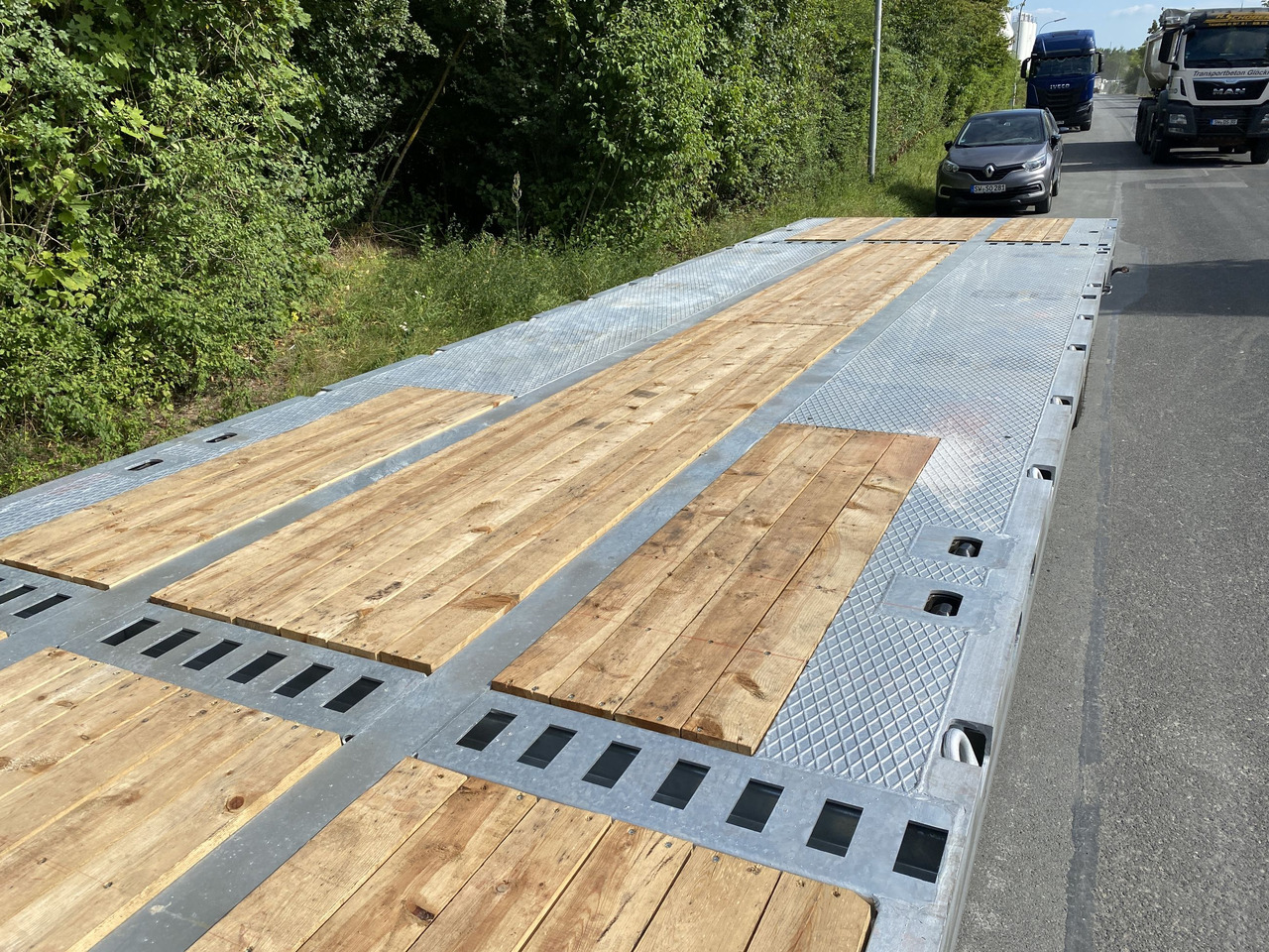 Möslein ST 3-Plato 9,4 3 Achs Satteltieflader Plato 45 t GGfür Fertigteile, Baumaschinen oder Container - Полуприцеп бортовой/ Платформа: фото 4 Möslein ST 3-Plato 9,4 3 Achs Satteltieflader Plato 45 t GGfür Fertigteile, Baumaschinen oder Container - Полуприцеп бортовой/ Платформа: фото 4