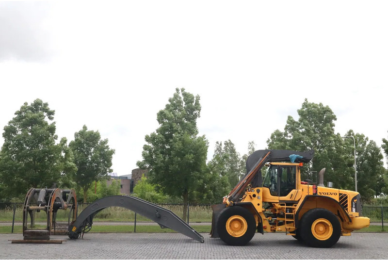Volvo L180 F HL | HIGH-LIFT | LOG STACKER | HOLZ GRAPPLE - Лесозаготовительная техника: фото 1 Volvo L180 F HL | HIGH-LIFT | LOG STACKER | HOLZ GRAPPLE - Лесозаготовительная техника: фото 1