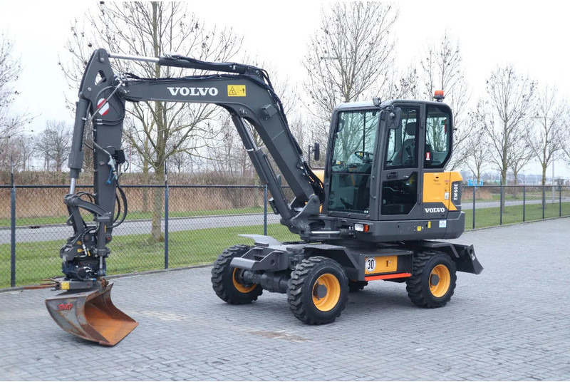 Volvo EW 60 E | DEMO | 30 KM/H | ROTOTILT + GRIPPER | BUCKET - Колёсный экскаватор: фото 2 Volvo EW 60 E | DEMO | 30 KM/H | ROTOTILT + GRIPPER | BUCKET - Колёсный экскаватор: фото 2