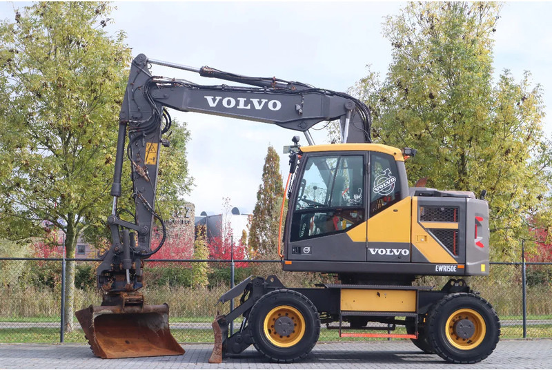 Volvo EWR 150 E | ROTOTILT | BUCKET | TRAILER HYDR - Колёсный экскаватор: фото 1 Volvo EWR 150 E | ROTOTILT | BUCKET | TRAILER HYDR - Колёсный экскаватор: фото 1