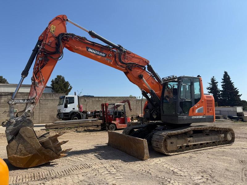 Doosan DX235LCR - Гусеничный экскаватор: фото 1 Doosan DX235LCR - Гусеничный экскаватор: фото 1