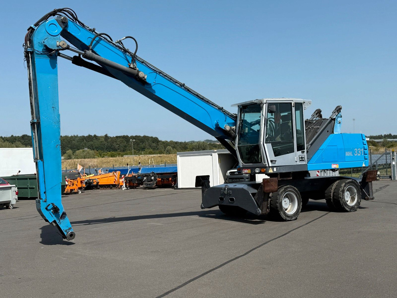 Fuchs MHL 331 - Колёсный экскаватор: фото 3 Fuchs MHL 331 - Колёсный экскаватор: фото 3