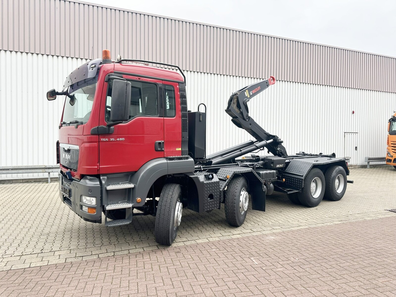 MAN TGS 35.480 8X4 BL TGS 35.400 8x4 BL, Schub-Knick bis 6,5m Container - Крюковой мультилифт: фото 1 MAN TGS 35.480 8X4 BL TGS 35.400 8x4 BL, Schub-Knick bis 6,5m Container - Крюковой мультилифт: фото 1