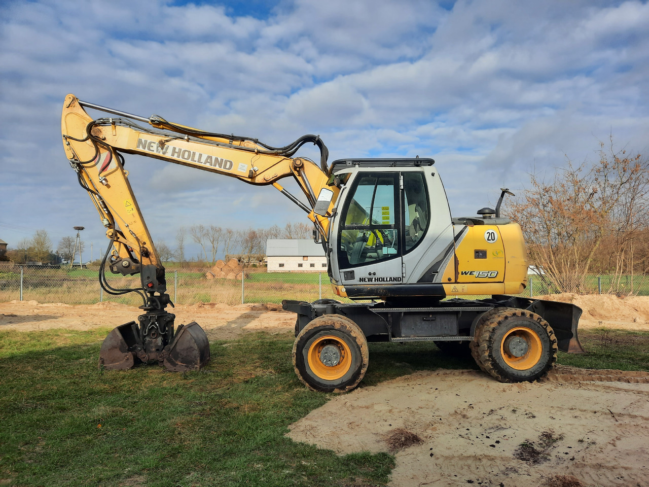 NEW HOLLAND WE150C - Колёсный экскаватор: фото 2 NEW HOLLAND WE150C - Колёсный экскаватор: фото 2
