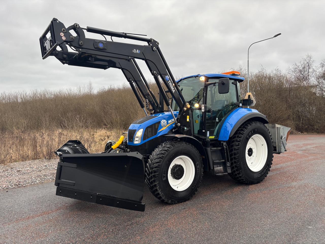 New Holland T5.115 - Трактор: фото 1 New Holland T5.115 - Трактор: фото 1