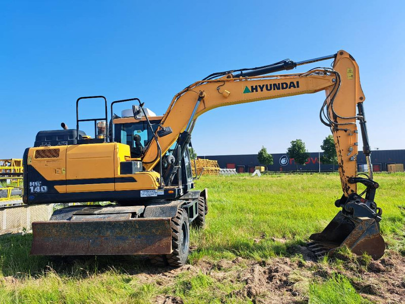 Hyundai HW 140 - Колёсный экскаватор: фото 4 Hyundai HW 140 - Колёсный экскаватор: фото 4