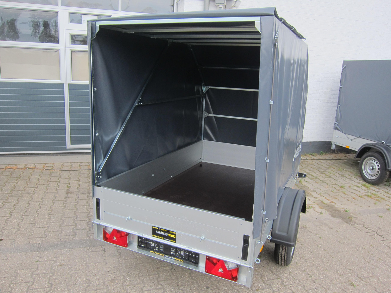 Aluliner Planen Anhänger GT 750 201x101x120cm +Hochplane aero grau (XS) 750kg - Прицеп для легкового автомобиля: фото 4 Aluliner Planen Anhänger GT 750 201x101x120cm +Hochplane aero grau (XS) 750kg - Прицеп для легкового автомобиля: фото 4