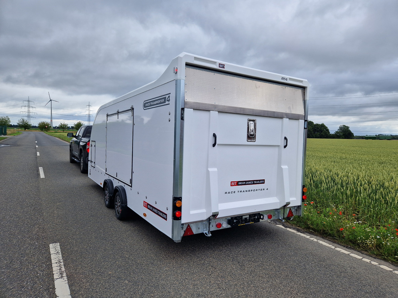 Прицеп-автовоз BJT Race Transporter 4 550x212x188cm weiss E Winde Frontstauraum ASR Alufelgen dark 3500kg Modell 24: фото 13