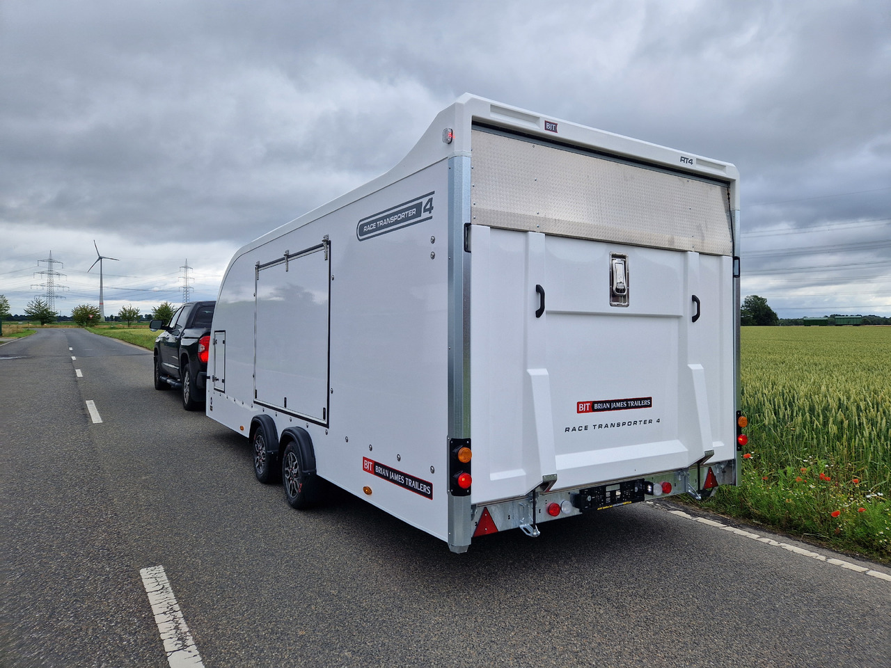 Прицеп-автовоз BJT Race Transporter 4 550x212x188cm weiss E Winde Frontstauraum ASR Alufelgen dark 3500kg Modell 24: фото 8