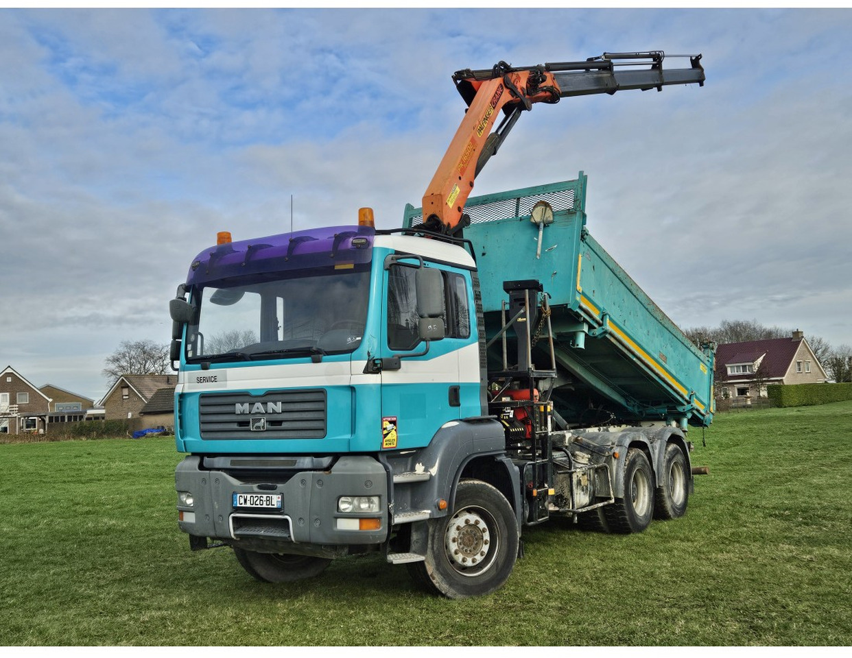 MAN TGA 33.360 TIPPER 3 SIDE CRANE PALFINGER 16502 *REMOTE CONTROL - Самосвал: фото 1 MAN TGA 33.360 TIPPER 3 SIDE CRANE PALFINGER 16502 *REMOTE CONTROL - Самосвал: фото 1