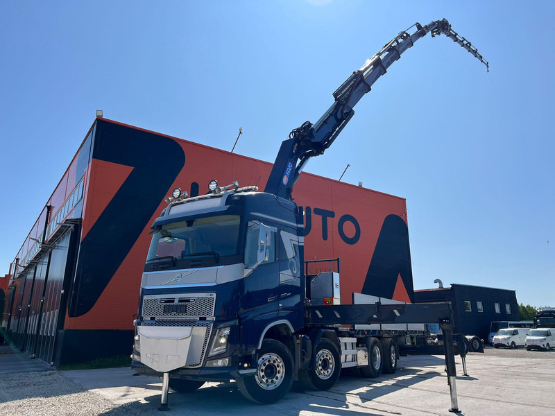 Volvo FH 16 650 8x2*6 HMF 6020K-RC + JIB / PLATFORM L=6344 mm - Грузовик бортовой/ Платформа, Автоманипулятор: фото 1 Volvo FH 16 650 8x2*6 HMF 6020K-RC + JIB / PLATFORM L=6344 mm - Грузовик бортовой/ Платформа, Автоманипулятор: фото 1