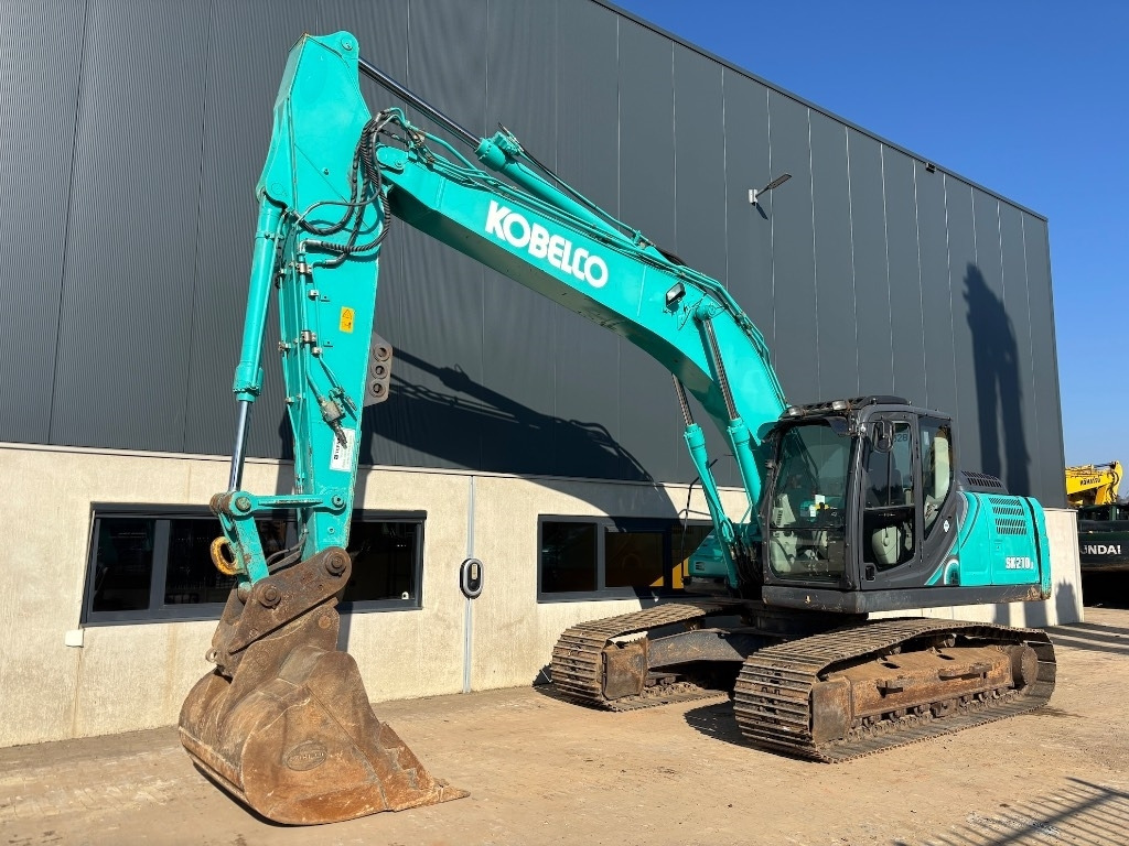 Kobelco SK 210 LC-10 - Kobelco SK210 - Гусеничный экскаватор: фото 1 Kobelco SK 210 LC-10 - Kobelco SK210 - Гусеничный экскаватор: фото 1