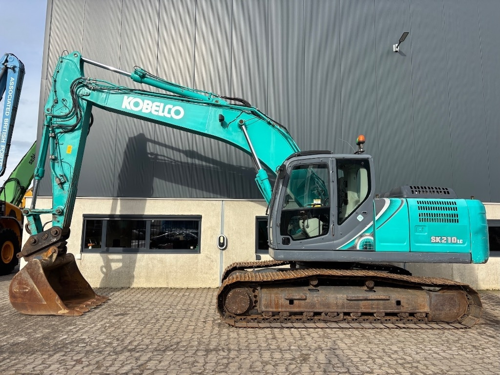 Kobelco SK 210 LC-10 - SK210 - SK 210 - Гусеничный экскаватор: фото 2 Kobelco SK 210 LC-10 - SK210 - SK 210 - Гусеничный экскаватор: фото 2