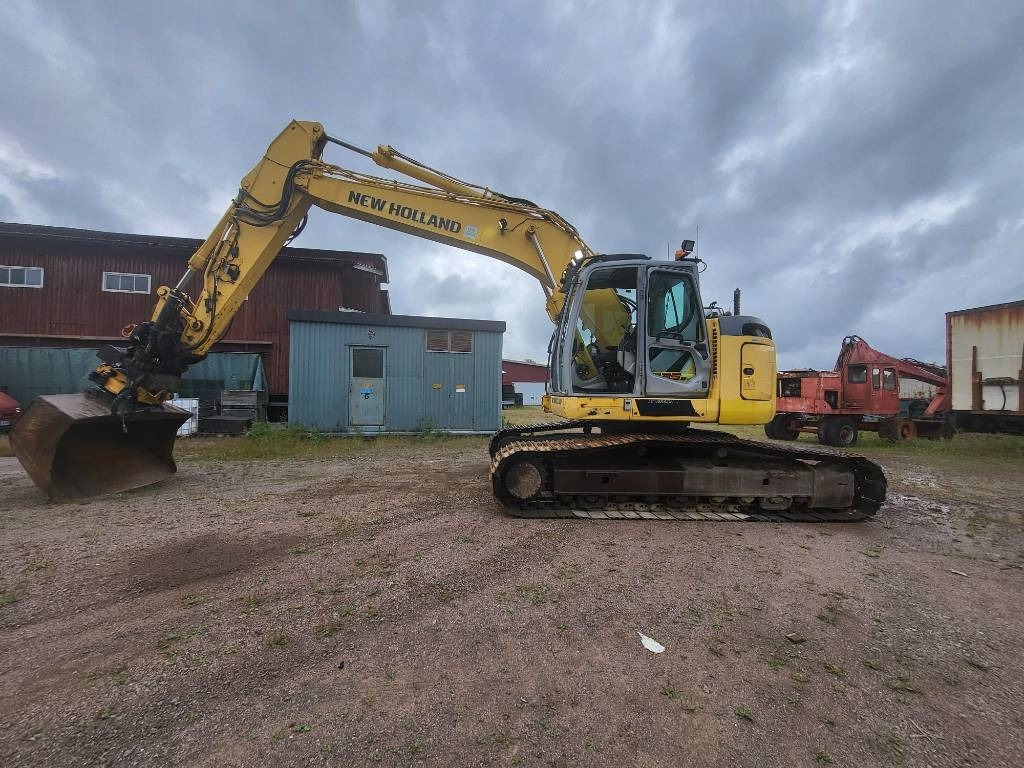 New Holland Kobelco E 235 B SR-2  - Гусеничный экскаватор: фото 2 New Holland Kobelco E 235 B SR-2  - Гусеничный экскаватор: фото 2