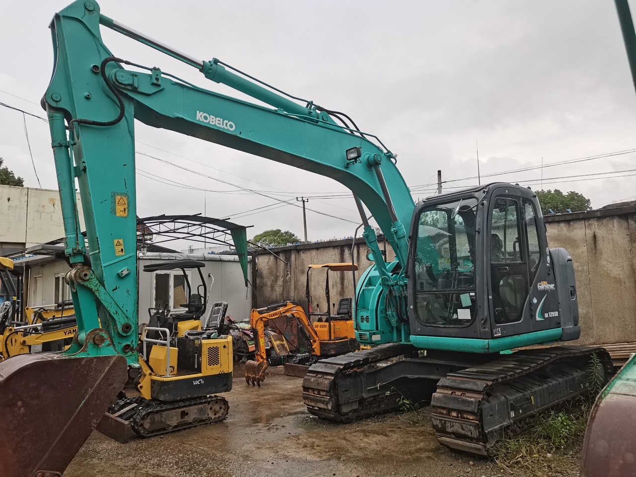 KOBELCO SK125SR - Гусеничный экскаватор: фото 1 KOBELCO SK125SR - Гусеничный экскаватор: фото 1