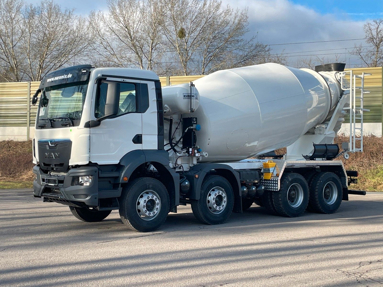 MAN TGS 41.400 8x4 / EuromixMTP EM 12m³ R / EURO 2 - Автобетоносмеситель: фото 4 MAN TGS 41.400 8x4 / EuromixMTP EM 12m³ R / EURO 2 - Автобетоносмеситель: фото 4