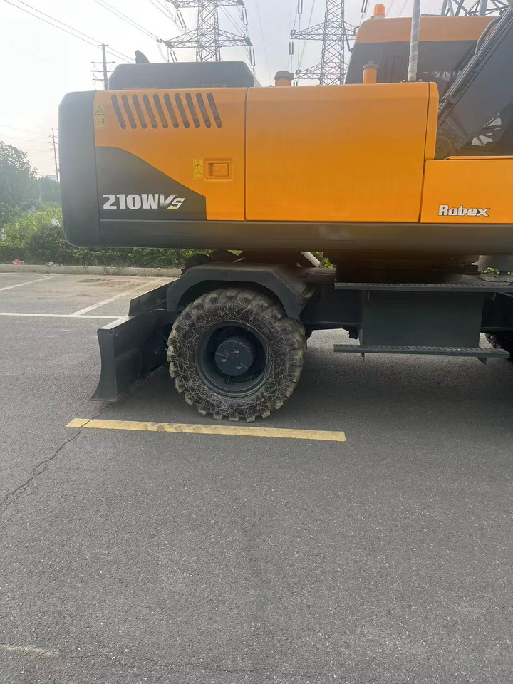 HYUNDAI R210W - Колёсный экскаватор: фото 4 HYUNDAI R210W - Колёсный экскаватор: фото 4