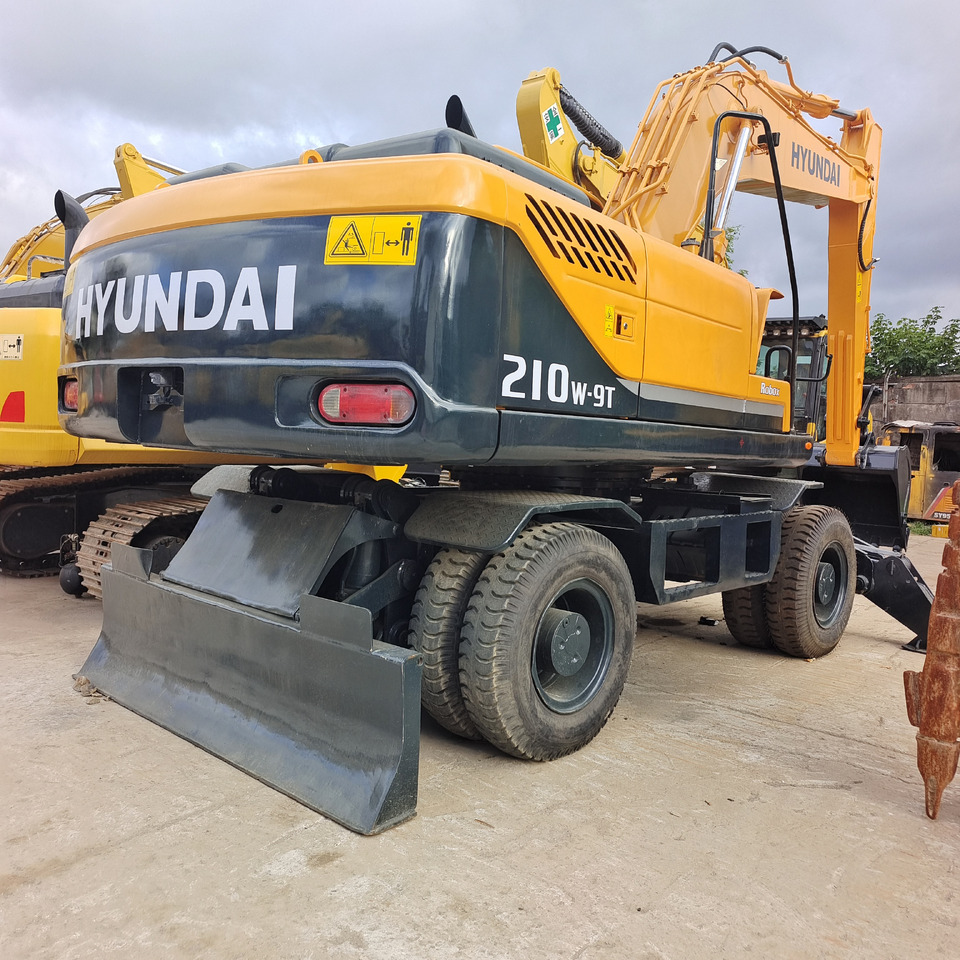HYUNDAI ROBEX 210W - 9T 210W-9 T - Колёсный экскаватор: фото 2 HYUNDAI ROBEX 210W - 9T 210W-9 T - Колёсный экскаватор: фото 2