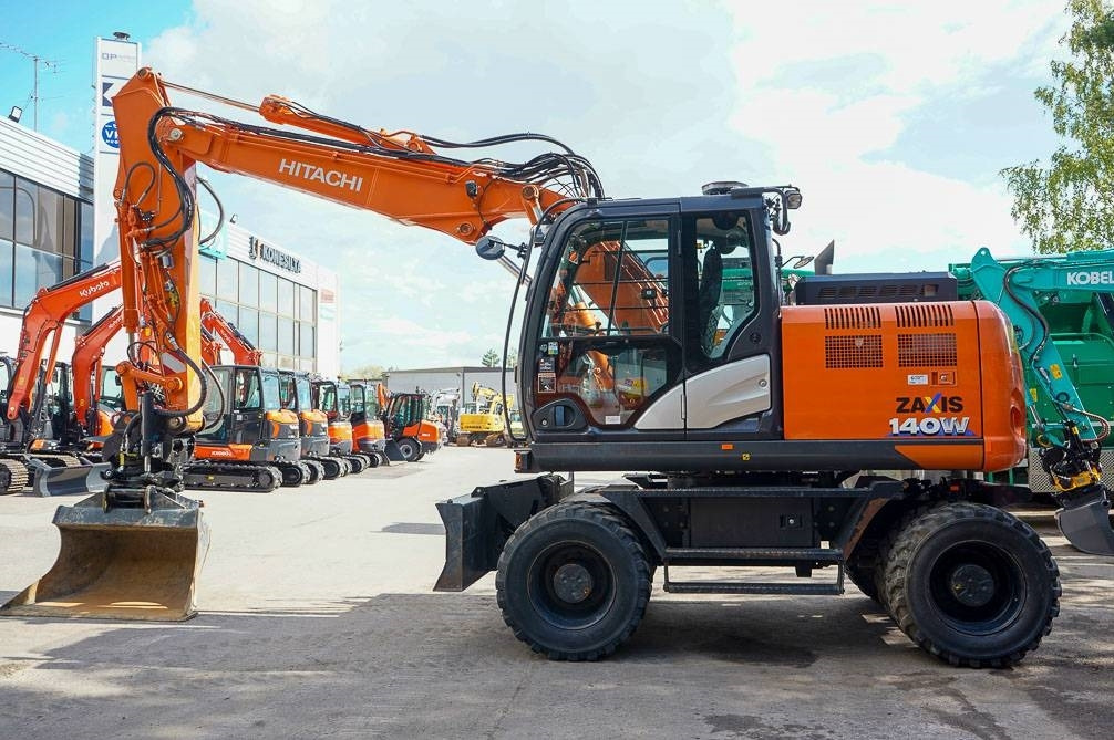 Hitachi ZX 140 W-6 - Колёсный экскаватор: фото 1 Hitachi ZX 140 W-6 - Колёсный экскаватор: фото 1