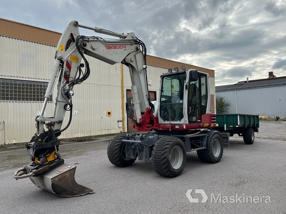 Hjulgrävare Takeuchi TB295W med vagn & redskap - Гусеничный экскаватор: фото 1 Hjulgrävare Takeuchi TB295W med vagn & redskap - Гусеничный экскаватор: фото 1