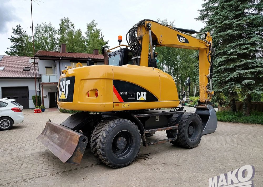 Caterpillar M313D - Колёсный экскаватор: фото 4 Caterpillar M313D - Колёсный экскаватор: фото 4