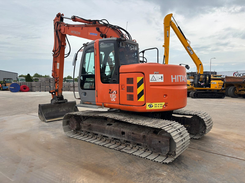 Hitachi ZX135US - Экскаватор: фото 1 Hitachi ZX135US - Экскаватор: фото 1