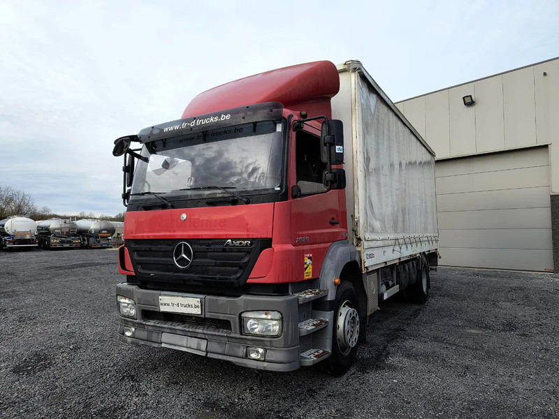 Mercedes-Benz Axor 1829 + D'HOLLANDIA 2000 KG - Тентованный грузовик: фото 1 Mercedes-Benz Axor 1829 + D'HOLLANDIA 2000 KG - Тентованный грузовик: фото 1